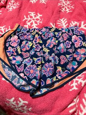 Simply Southern Navy Floral Athletic Shorts with Pink and Orange Accents